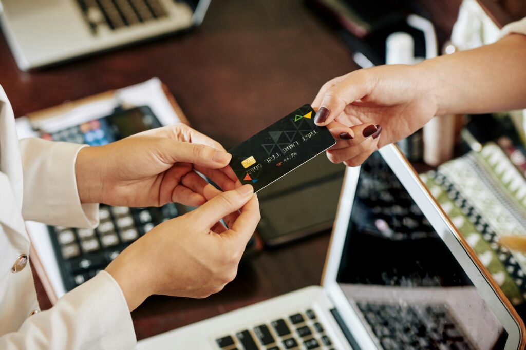 Woman paying with credit card